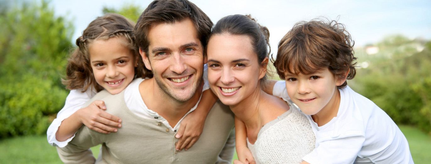 smiling family in AZ Dental